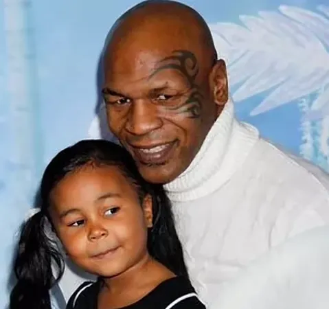 Mike Tyson junto a su hija