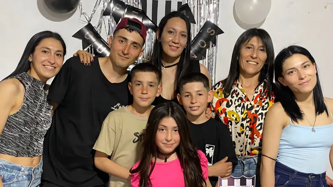 María Rosa y sus siete hijos.